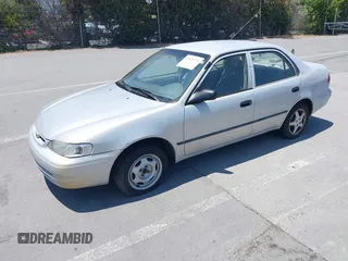 1999 Toyota Corolla VE with VIN 1NXBR12E5XZ240916, listed as a IAAI auction lot 42579723 with 152,938 mi miles and . Bid and sale history available at DreamBid. Image 2.