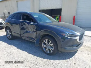 2024 Mazda CX-30 2.5 S Premium Package with VIN 3MVDMBDM7RM654243, listed as a IAAI auction lot 42044783 with 27,936 mi miles. Bid and sale history available at carsss.com. Image 1.