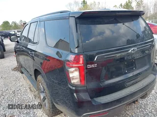 2021 Chevrolet Tahoe Z71 with VIN 1GNSKPKD8MR122190, listed as a IAAI auction lot 41587419 with 106,828 mi miles and . Bid and sale history available at DreamBid. Image 3.