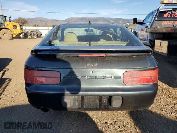 1995 Porsche 968 z VIN WP0AA2969SS820203, wystawiony jako Copart lot #87740995 z przebiegiem Nie podano mil oraz Szkoda całkowita • Salvage title. Historia ofert i sprzedaży dostępna na DreamBid. Obrazek 6.