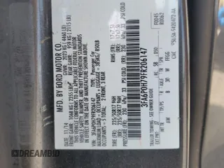 2015 Ford Fusion SE with VIN 3FA6P0H79FR206147, listed as a Copart auction lot 52902475 with 107,591 mi miles and Salvage title. Bid and sale history available at DreamBid. Image 13.