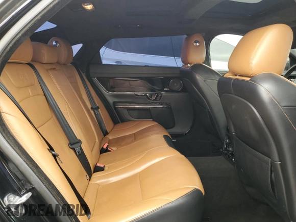 2014 Jaguar XJ with VIN SAJWA2EKXEMV64494, listed as a Copart auction lot 82634004 with 119,811 mi miles and Clean title. Bid and sale history available at DreamBid. Image 10.