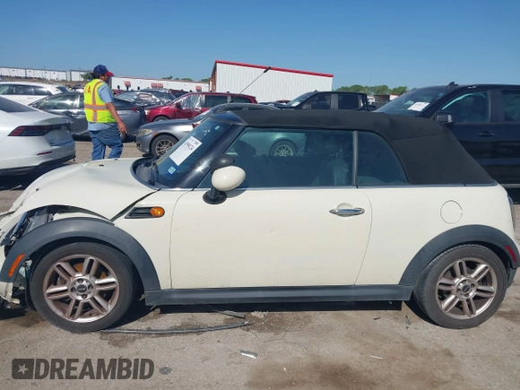 2013 MINI Convertible with VIN WMWZN3C58DT568824, listed as a IAAI auction lot 41998124 with 134,191 mi miles and . Bid and sale history available at DreamBid. Image 14.