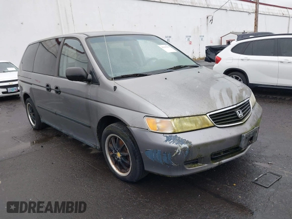 2000 Honda Odyssey LX z VIN 2HKRL1857YH570211, wystawiony jako IAAI lot #42139263 z przebiegiem 161 983 mil mil oraz . Historia ofert i sprzedaży dostępna na DreamBid. Obrazek 1.