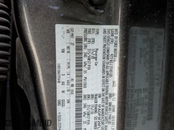 2015 Ford Focus SE z VIN 1FADP3F29FL340350, wystawiony jako Copart lot #53466455 z przebiegiem 146 374 mil mil oraz Szkoda całkowita • Salvage title. Historia ofert i sprzedaży dostępna na DreamBid. Obrazek 14.