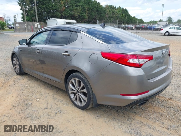 2012 Kia Optima SX with VIN 5XXGR4A6XCG077489, listed as a IAAI auction lot 42158726 with 158,229 mi miles and . Bid and sale history available at carsss.com. Image 3.