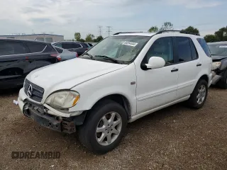 2000 Mercedes-Benz M 320/430/500 with VIN 4JGAB72E4YA167477, listed as a Copart auction lot 68554444 with 137,457 mi miles and Salvage title. Bid and sale history available at DreamBid. Image 1.