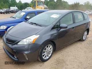 2014 Toyota Prius Two z VIN JTDZN3EU8EJ000528, wystawiony jako IAAI lot #42107405 z przebiegiem 312 421 mil mil oraz . Historia ofert i sprzedaży dostępna na DreamBid. Obrazek 2.