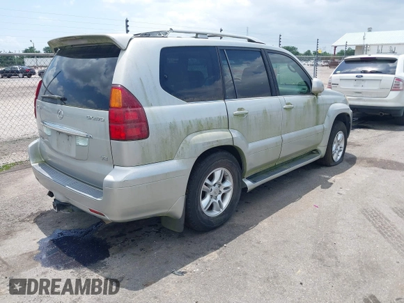 2005 Lexus GX with VIN JTJBT20X550082871, listed as a IAAI auction lot 42080527 with Not Provided miles. Bid and sale history available at carsss.com. Image 4.