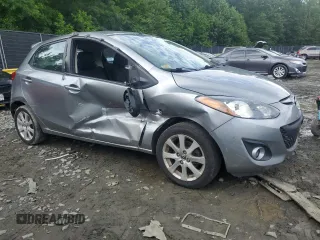 2013 Mazda 2 Touring z VIN JM1DE1LZ7D0153662, wystawiony jako Copart lot #58562435 z przebiegiem 109 329 mil mil oraz Szkoda całkowita • Salvage title. Historia ofert i sprzedaży dostępna na DreamBid. Obrazek 4.