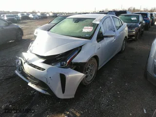 2022 Toyota Prius L Eco with VIN JTDKAMFU5N3156063, listed as a IAAI auction lot 41214358 with 208,666 mi miles. Bid and sale history available at carsss.com. Image 18.