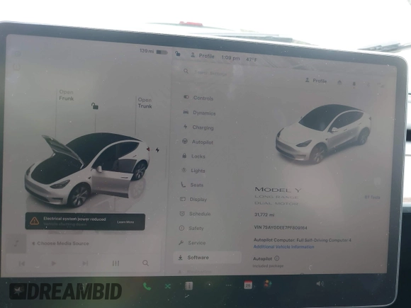 2023 Tesla Model Y Long Range with VIN 7SAYGDEE7PF809164, listed as a IAAI auction lot 41828974 with 31,772 mi miles. Bid and sale history available at carsss.com. Image 7.