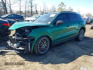 2022 Porsche Cayenne E-Hybrid Hybrid z VIN WP1AE2AY7NDA26826, wystawiony jako IAAI lot #41669548 z przebiegiem 22 644 mil mil oraz . Historia ofert i sprzedaży dostępna na DreamBid. Obrazek 2.