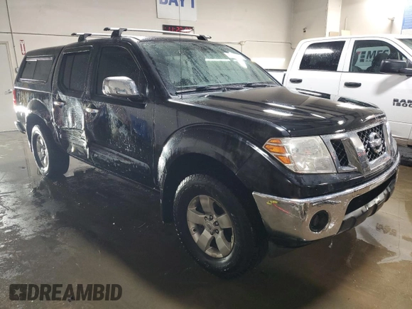2010 Nissan Frontier Pro-4X z VIN 1N6AD0EV9AC419166, wystawiony jako Copart lot #50918515 z przebiegiem 143 276 mil mil oraz Szkoda całkowita • Salvage title. Historia ofert i sprzedaży dostępna na DreamBid. Obrazek 4.