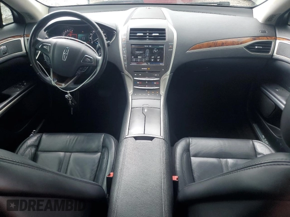 2015 Lincoln MKZ z VIN 3LN6L2G9XFR611837, wystawiony jako Copart lot #55038635 z przebiegiem 133 596 mil mil oraz Szkoda całkowita • Salvage title. Historia ofert i sprzedaży dostępna na DreamBid. Obrazek 8.