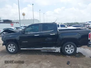 2015 GMC Canyon 2WD SLE with VIN 1GTG5BE3XF1226497, listed as a IAAI auction lot 42106960 with 97,360 mi miles and . Bid and sale history available at carsss.com. Image 15.