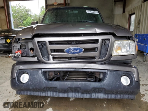 2011 Ford Ranger XLT с VIN 1FTLR4FE7BPA70943, выставлен на аукционе Copart как лот 57523295 с пробегом 107 718 миль миль и Списание • Salvage title. История ставок и продаж доступна на DreamBid. Изображение 5.
