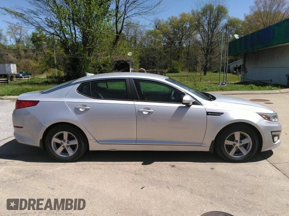 2014 Kia Optima LX with VIN 5XXGM4A70EG340051, listed as a IAAI auction lot 42048762 with 146,519 mi miles. Bid and sale history available at carsss.com. Image 14.