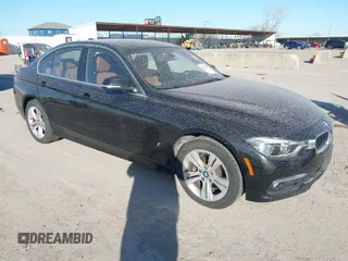 2017 BMW 3 Series 330e iPerformance with VIN WBA8E1C34HA156688, listed as a IAAI auction lot 41753490 with 74,130 mi miles. Bid and sale history available at carsss.com. Image 1.