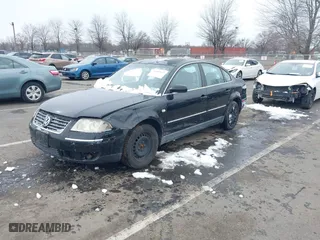 2003 Volkswagen Passat GL with VIN WVWMD63B03P039933, listed as a IAAI auction lot 41485822 with 133,907 mi miles. Bid and sale history available at carsss.com. Image 2.