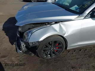 2018 Cadillac ATS RWD z VIN 1G6AA5RX7J0173114, wystawiony jako IAAI lot #41592867 z przebiegiem 50 393 mil mil oraz . Historia ofert i sprzedaży dostępna na DreamBid. Obrazek 16.