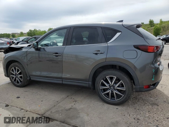 2018 Mazda CX-5 Touring z VIN JM3KFBCM2J0379190, wystawiony jako Copart lot #59233075 z przebiegiem 51 985 mil mil oraz Szkoda całkowita • Salvage title. Historia ofert i sprzedaży dostępna na DreamBid. Obrazek 2.