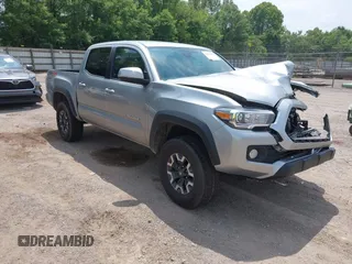 2023 Toyota Tacoma SR z VIN 3TMCZ5ANXPM539999, wystawiony jako IAAI lot #42414145 z przebiegiem 57 790 mil mil oraz . Historia ofert i sprzedaży dostępna na DreamBid. Obrazek 1.