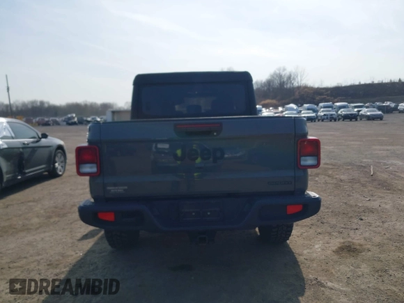 2020 Jeep Gladiator Sport S with VIN 1C6HJTAG2LL157701, listed as a IAAI auction lot 41766647 with 62,571 mi miles. Bid and sale history available at carsss.com. Image 16.