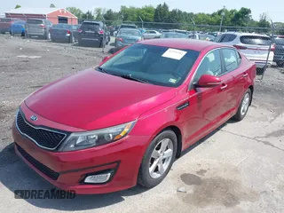 2015 Kia Optima LX z VIN 5XXGM4A72FG407864, wystawiony jako IAAI lot #42295392 z przebiegiem 177 485 mil mil oraz . Historia ofert i sprzedaży dostępna na DreamBid. Obrazek 2.