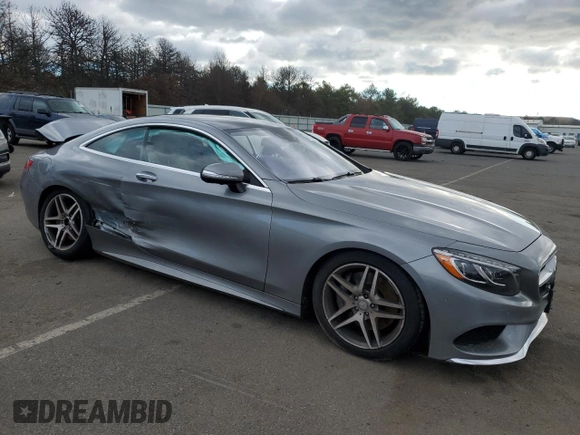 2015 Mercedes-Benz S 550 with VIN WDDXJ8FB8FA001215, listed as a Copart auction lot 86525344 with 62,996 mi miles and Salvage Title. Bid and sale history available at DreamBid. Image 4.