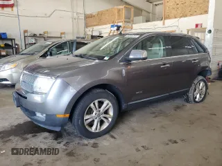 2010 Lincoln MKX z VIN 2LMDJ8JC7ABJ28712, wystawiony jako Copart lot #54695755 z przebiegiem 162 526 mil mil oraz Szkoda całkowita • Salvage title. Historia ofert i sprzedaży dostępna na DreamBid. Obrazek 1.