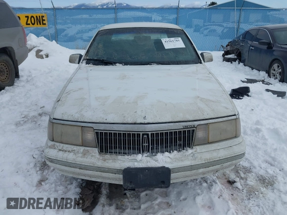 1991 Lincoln Continental with VIN 1LNCM9745MY632946, listed as a IAAI auction lot 41561785 with 124,186 mi miles and . Bid and sale history available at DreamBid. Image 13.