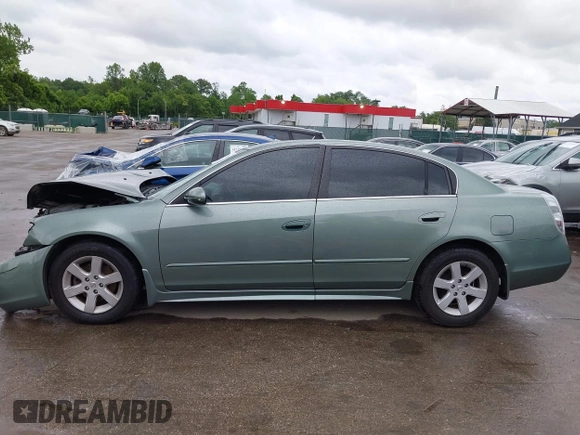 2003 Nissan Altima S z VIN 1N4AL11DX3C295443, wystawiony jako IAAI lot #42278216 z przebiegiem 145 415 mil mil oraz . Historia ofert i sprzedaży dostępna na DreamBid. Obrazek 14.