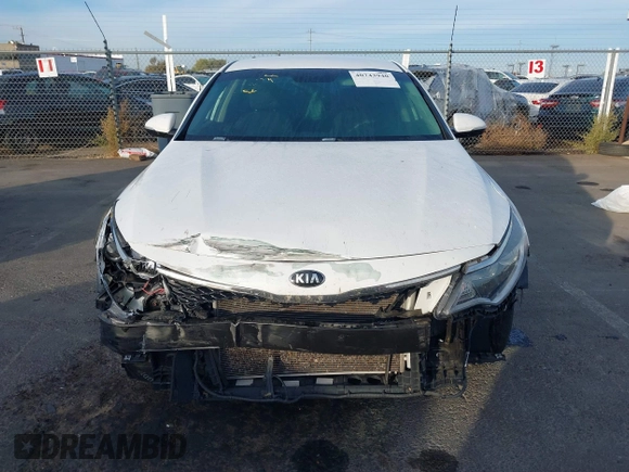 2016 Kia Optima LX with VIN 5XXGT4L34GG062691, listed as a IAAI auction lot 40743940 with 99,069 mi miles and . Bid and sale history available at DreamBid. Image 12.