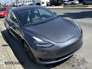 2018 Tesla Model 3 Long Range Battery with VIN 5YJ3E1EA8JF026497, listed as a IAAI auction lot 41987950 with 72,373 mi miles. Bid and sale history available at carsss.com. Image 1.