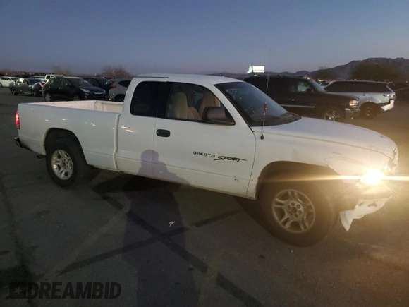 2001 Dodge Dakota Sport with VIN 1B7GL22N71S341217, listed as a Copart auction lot 86552684 with 149,608 mi miles and Salvage Title. Bid and sale history available at carsss.com. Image 4.