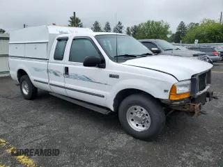 1999 Ford F-250 XL with VIN 1FTNX20L3XEA81807, listed as a Copart auction lot 58036385 with 251,614 mi miles and Salvage title. Bid and sale history available at DreamBid. Image 4.