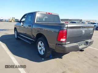 2015 Ram 1500 Tradesman with VIN 1C6RR7KG1FS769305, listed as a IAAI auction lot 41337285 with 97,052 mi miles and . Bid and sale history available at DreamBid. Image 3.