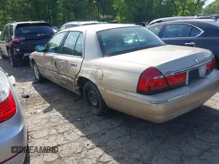 2000 Mercury Grand Marquis LS z VIN 2MEFM75W5YX627647, wystawiony jako IAAI lot #42072795 z przebiegiem 188 113 mil mil oraz . Historia ofert i sprzedaży dostępna na DreamBid. Obrazek 3.