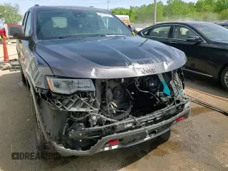 2017 Jeep Grand Cherokee Trailhawk with VIN 1C4RJFLGXHC654112, listed as a Copart auction lot 56397195 with 168,136 mi miles and Salvage title. Bid and sale history available at DreamBid. Image 15.