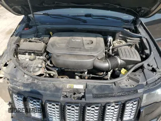 2018 Jeep Grand Cherokee Laredo E with VIN 1C4RJFAG9JC390597, listed as a Copart auction lot 71450474 with 69,645 mi miles and Salvage title. Bid and sale history available at DreamBid. Image 12.