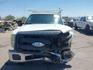 2012 Ford F-250 XL z VIN 1FDBF2A60CEC68510, wystawiony jako IAAI lot #42396003 z przebiegiem 185 303 mil mil oraz . Historia ofert i sprzedaży dostępna na DreamBid. Obrazek 13.