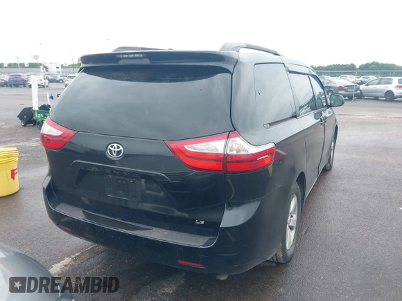2015 Toyota Sienna LE AAS with VIN 5TDKK3DC9FS618254, listed as a IAAI auction lot 42653368 with 337,308 mi miles and . Bid and sale history available at DreamBid. Image 4.