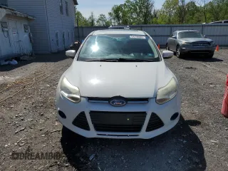 2013 Ford Focus SE z VIN 1FADP3F24DL128940, wystawiony jako Copart lot #54798665 z przebiegiem Nie podano mil oraz Tytuł czysty. Historia ofert i sprzedaży dostępna na DreamBid. Obrazek 5.