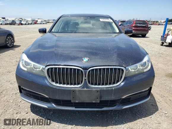 2018 BMW 7 Series 740i with VIN WBA7E2C58JG743126, listed as a Copart auction lot 53843795 with 90,614 mi miles and Salvage title. Bid and sale history available at DreamBid. Image 5.