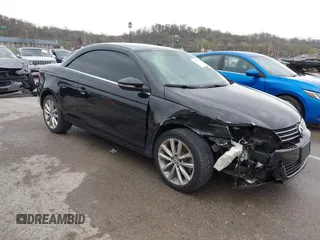 2014 Volkswagen Eos Komfort with VIN WVWBW8AH4EV007229, listed as a IAAI auction lot 41894160 with 66,984 mi miles and . Bid and sale history available at DreamBid. Image 1.