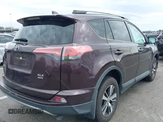2018 Toyota RAV4 XLE with VIN 2T3RFREV5JW811742, listed as a IAAI auction lot 42030276 with 58,034 mi miles. Bid and sale history available at carsss.com. Image 4.