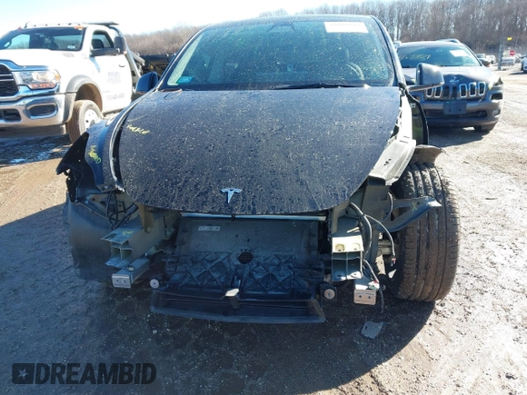 2022 Tesla Model Y Performance with VIN 7SAYGDEFXNF313636, listed as a IAAI auction lot 41660019 with 30,258 mi miles and . Bid and sale history available at DreamBid. Image 13.