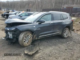 2022 Cadillac XT6 Premium Luxury with VIN 1GYKPDRS9NZ120814, listed as a Copart auction lot 51143485 with 70,977 mi miles and Salvage Title. Bid and sale history available at carsss.com. Image 1.