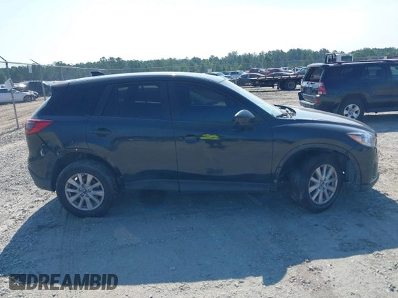 2014 Mazda CX-5 Sport z VIN JM3KE2BE2E0325715, wystawiony jako IAAI lot #42683243 z przebiegiem 262 005 mil mil oraz . Historia ofert i sprzedaży dostępna na DreamBid. Obrazek 13.